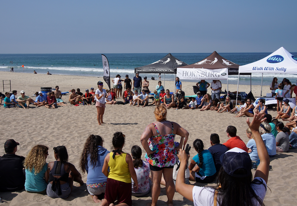 Mentors Mentees and Families attending the Walk With Sally Surf Day Friendship Activity